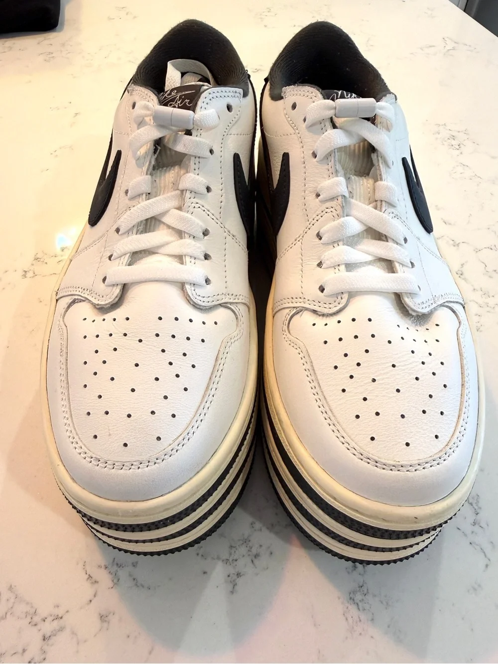 nike women’s air jordan 1 triple stack platform sneakers 9